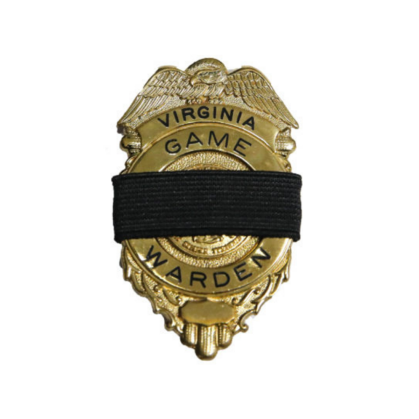 Una insignia dorada de guardabosques de Virginia.
